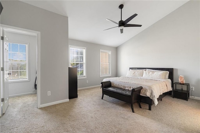 4901 Wilkie Way NW, Acworth, GA 30102 - carpeted bedroom featuring multiple windows, vaulted ceiling, and ceiling fan