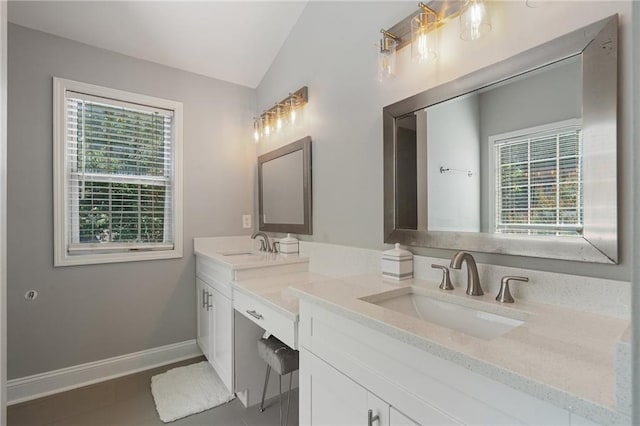 4901 Wilkie Way NW, Acworth, GA 30102 - full bath with double vanity, vaulted ceiling, and tile patterned floors