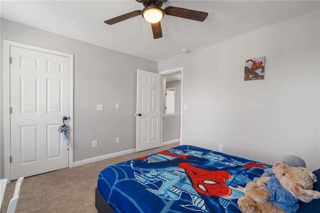 4901 Wilkie Way NW, Acworth, GA 30102 - carpeted bedroom featuring a ceiling fan and baseboards