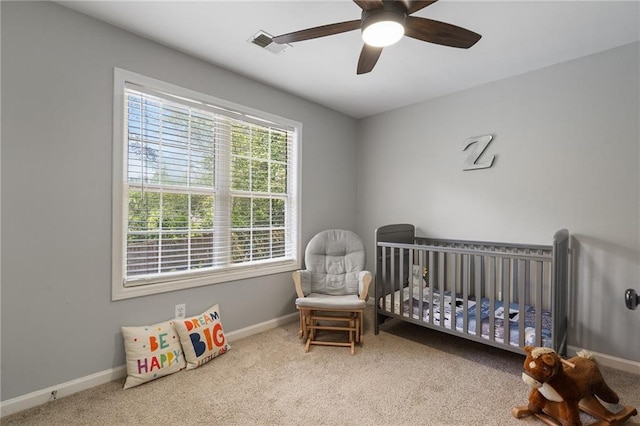 4901 Wilkie Way NW, Acworth, GA 30102 - carpeted bedroom featuring a nursery area and ceiling fan