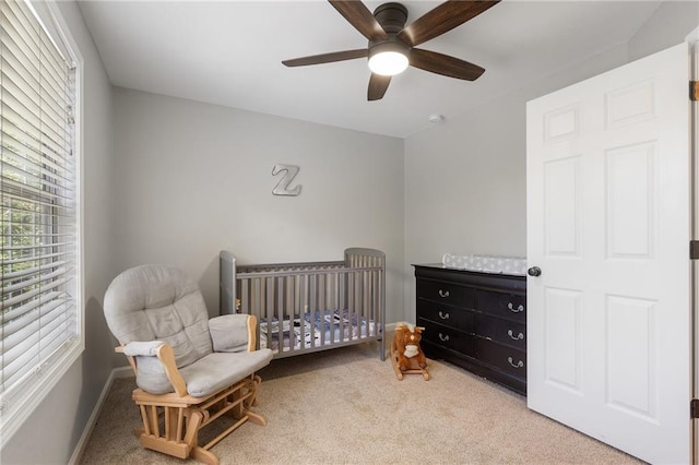 4901 Wilkie Way NW, Acworth, GA 30102 - bedroom with light carpet, a nursery area, and ceiling fan