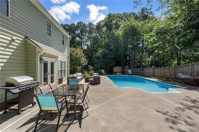4901 Wilkie Way NW, Acworth, GA 30102 - view of swimming pool with french doors, a patio, a fenced backyard, area for grilling, and view of wooded area
