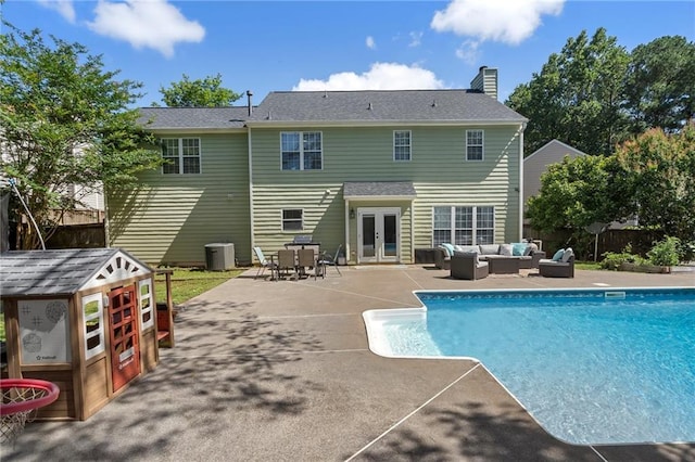 4901 Wilkie Way NW, Acworth, GA 30102 - rear view of house featuring outdoor lounge area, french doors, a chimney, a patio, and an outdoor pool