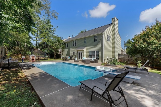 4901 Wilkie Way NW, Acworth, GA 30102 - view of pool with outdoor lounge area, a patio area, a fenced backyard, and a diving board