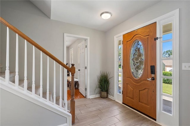 4901 Wilkie Way NW, Acworth, GA 30102 - entryway featuring healthy amount of natural light, wood tiled floors, and stairs