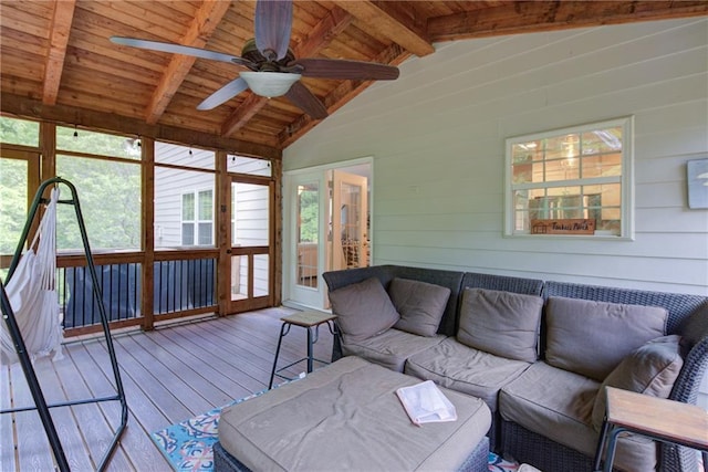 sunroom / solarium featuring a ceiling fan, french doors, and plenty of natural light