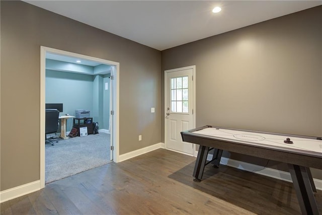 rec room featuring wood finished floors, baseboards, an office area, and recessed lighting