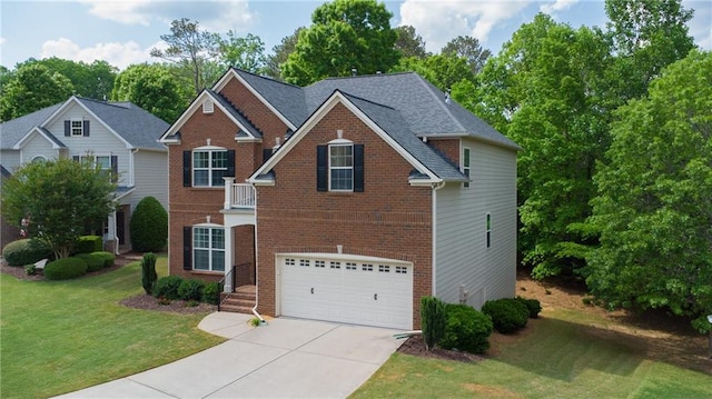 view of front of property featuring driveway, a garage, brick siding, and a front yard
