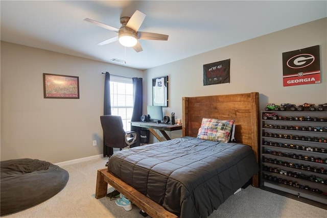 bedroom featuring carpet, baseboards, and a ceiling fan