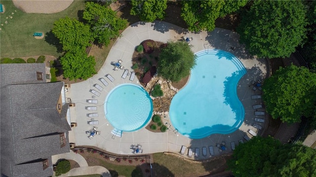 drone / aerial view of a pool area