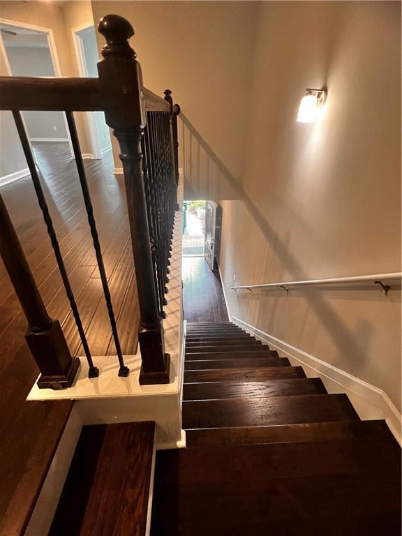 2778 Wild Laurel Ct, Norcross, GA 30071 - staircase with baseboards