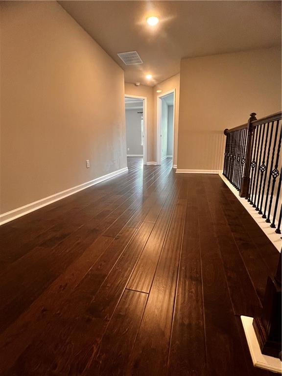 2778 Wild Laurel Ct, Norcross, GA 30071 - unfurnished room featuring dark wood-style floors and baseboards