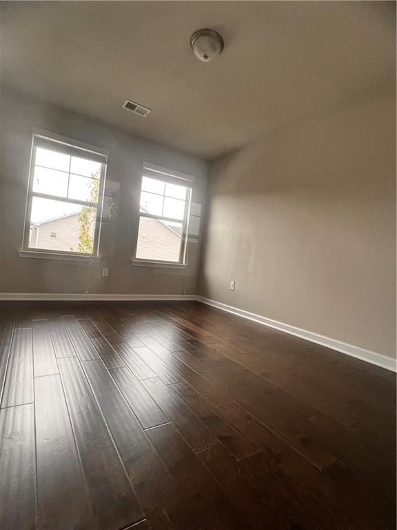 2778 Wild Laurel Ct, Norcross, GA 30071 - unfurnished room featuring baseboards and dark wood finished floors
