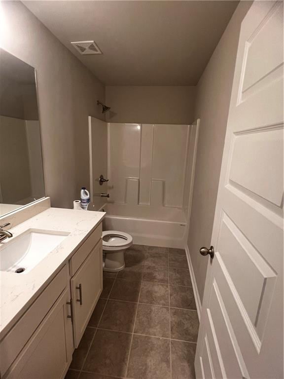 2778 Wild Laurel Ct, Norcross, GA 30071 - bathroom featuring vanity, toilet, washtub / shower combination, and tile patterned flooring