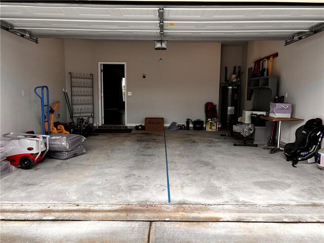 2778 Wild Laurel Ct, Norcross, GA 30071 - garage with water heater and a garage door opener