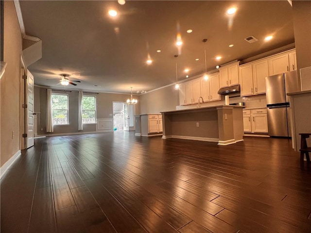 2778 Wild Laurel Ct, Norcross, GA 30071 - unfurnished living room with a chandelier, a ceiling fan, a sink, dark wood-style floors, and baseboards