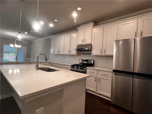 2778 Wild Laurel Ct, Norcross, GA 30071 - kitchen with stainless steel appliances, under cabinet range hood, a sink, ornamental molding, and decorative backsplash