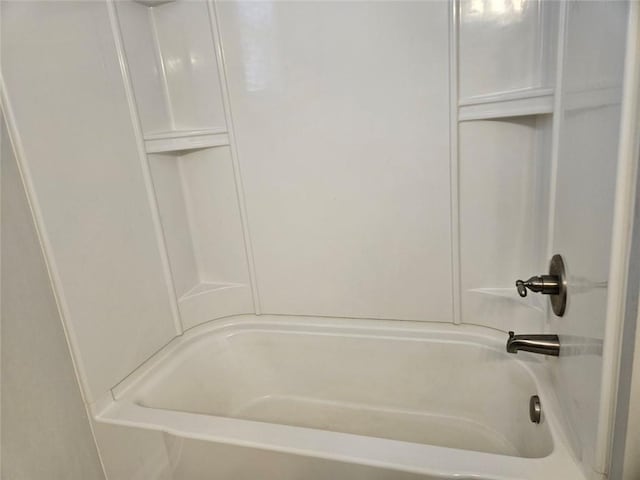 bathroom with shower / bathtub combination