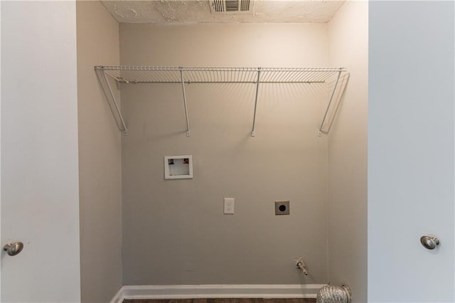 laundry area with hookup for an electric dryer and washer hookup