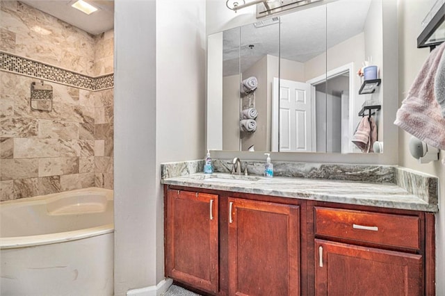 bathroom with vanity and tiled shower / bath combo