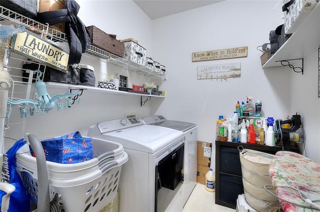 laundry room with washer and dryer