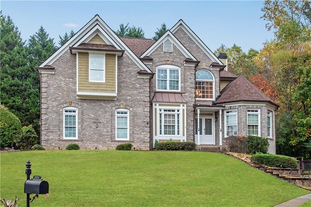 view of front facade with a front yard