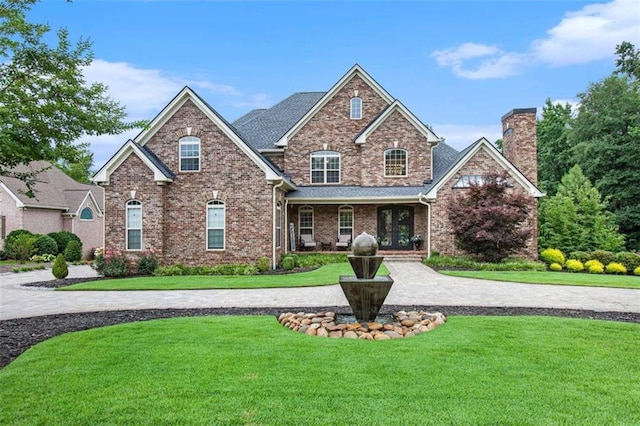 view of front of home with a front yard