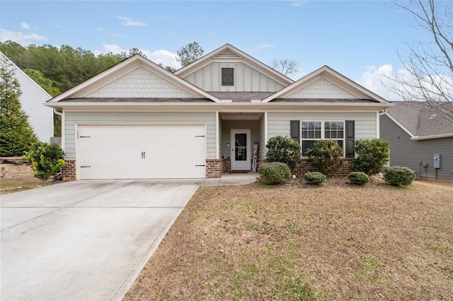 view of front of home with a garage and a front lawn