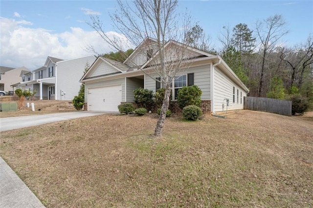 single story home featuring a garage and a front lawn