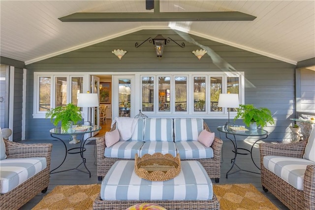 sunroom / solarium with vaulted ceiling