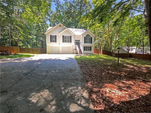 bi-level home featuring a garage