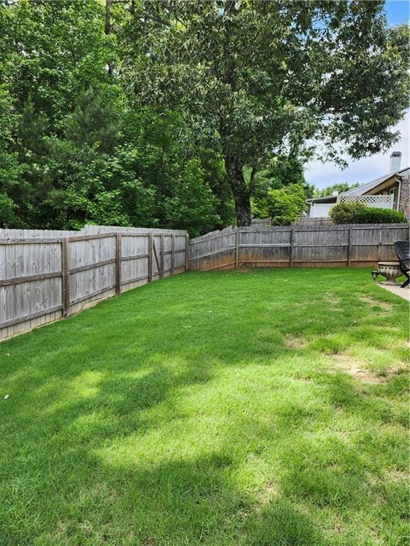 979 Simonton Glen Dr, Lawrenceville, GA 30045 - view of fenced backyard