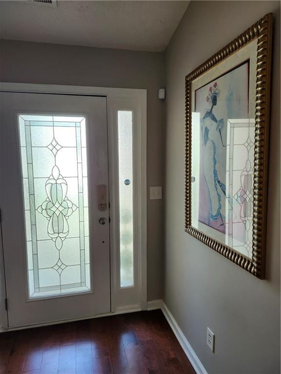 979 Simonton Glen Dr, Lawrenceville, GA 30045 - entryway featuring baseboards and dark wood-type flooring
