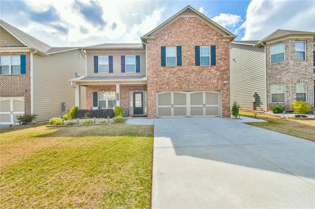 view of front of house featuring a front lawn, a garage, brick siding, and driveway