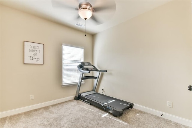 workout area featuring visible vents, baseboards, carpet flooring, and a ceiling fan