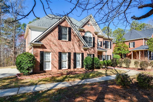 view of front of property with brick siding