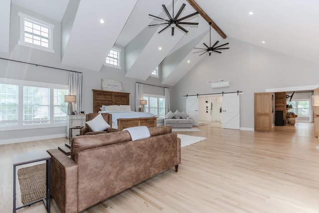 6044 Wade Orr Rd, Flowery Branch, GA 30542 - living room featuring high vaulted ceiling, beamed ceiling, a ceiling fan, light wood-style flooring, and a barn door