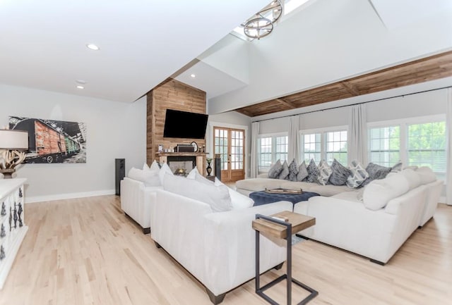 6044 Wade Orr Rd, Flowery Branch, GA 30542 - living room with healthy amount of natural light, light wood-type flooring, recessed lighting, and a large fireplace