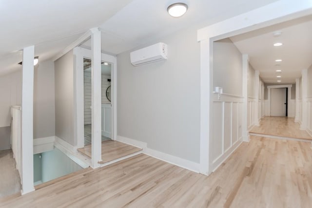 6044 Wade Orr Rd, Flowery Branch, GA 30542 - corridor with a wall mounted air conditioner, wood finished floors, and recessed lighting