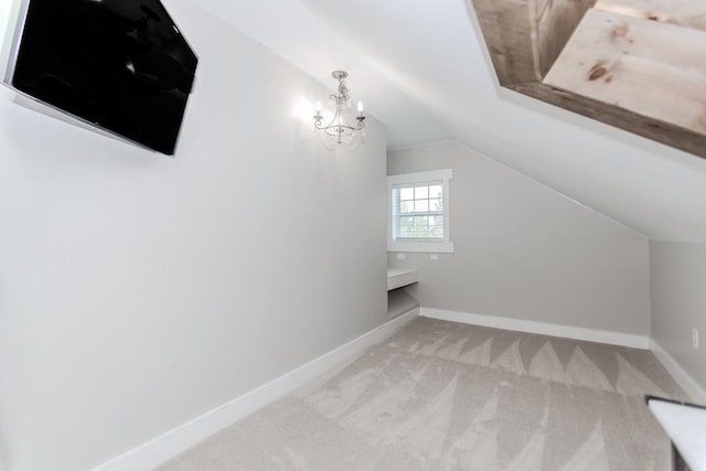 6044 Wade Orr Rd, Flowery Branch, GA 30542 - bonus room with lofted ceiling, carpet flooring, and a chandelier
