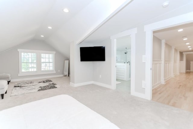 6044 Wade Orr Rd, Flowery Branch, GA 30542 - unfurnished bedroom featuring light carpet, recessed lighting, lofted ceiling, and ensuite bath