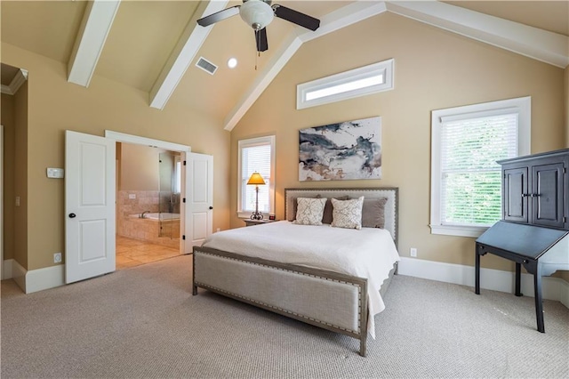 carpeted bedroom featuring baseboards, ensuite bathroom, beamed ceiling, and visible vents