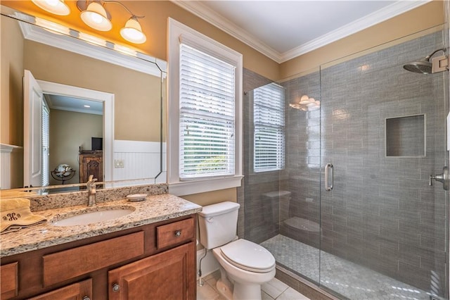 full bath with crown molding, vanity, a shower stall, and toilet