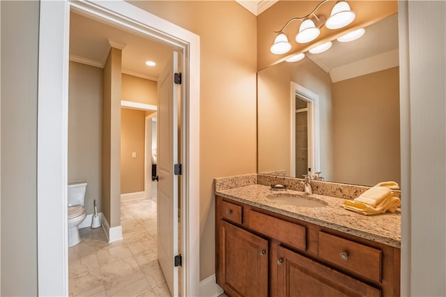 bathroom with crown molding, toilet, baseboards, and marble finish floor