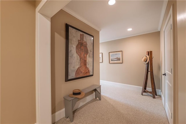 hallway with crown molding, recessed lighting, and carpet floors