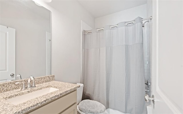 bathroom with vanity and walk in shower