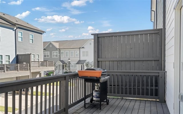 wooden deck with grilling area