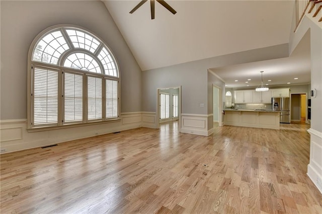 full bath featuring tile patterned flooring, crown molding, an enclosed shower, and vanity