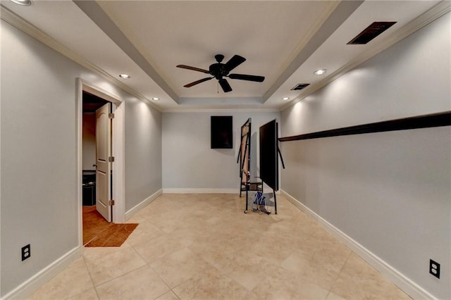 kitchen with a sink, light wood-style floors, white cabinets, crown molding, and dishwasher