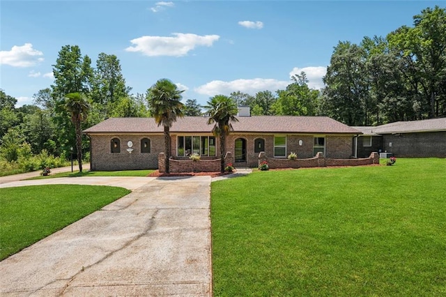 12 Windsor Way, Newnan, GA 30263 - ranch-style house featuring concrete driveway, a front lawn, and brick siding